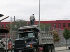 fat man on a dump truck